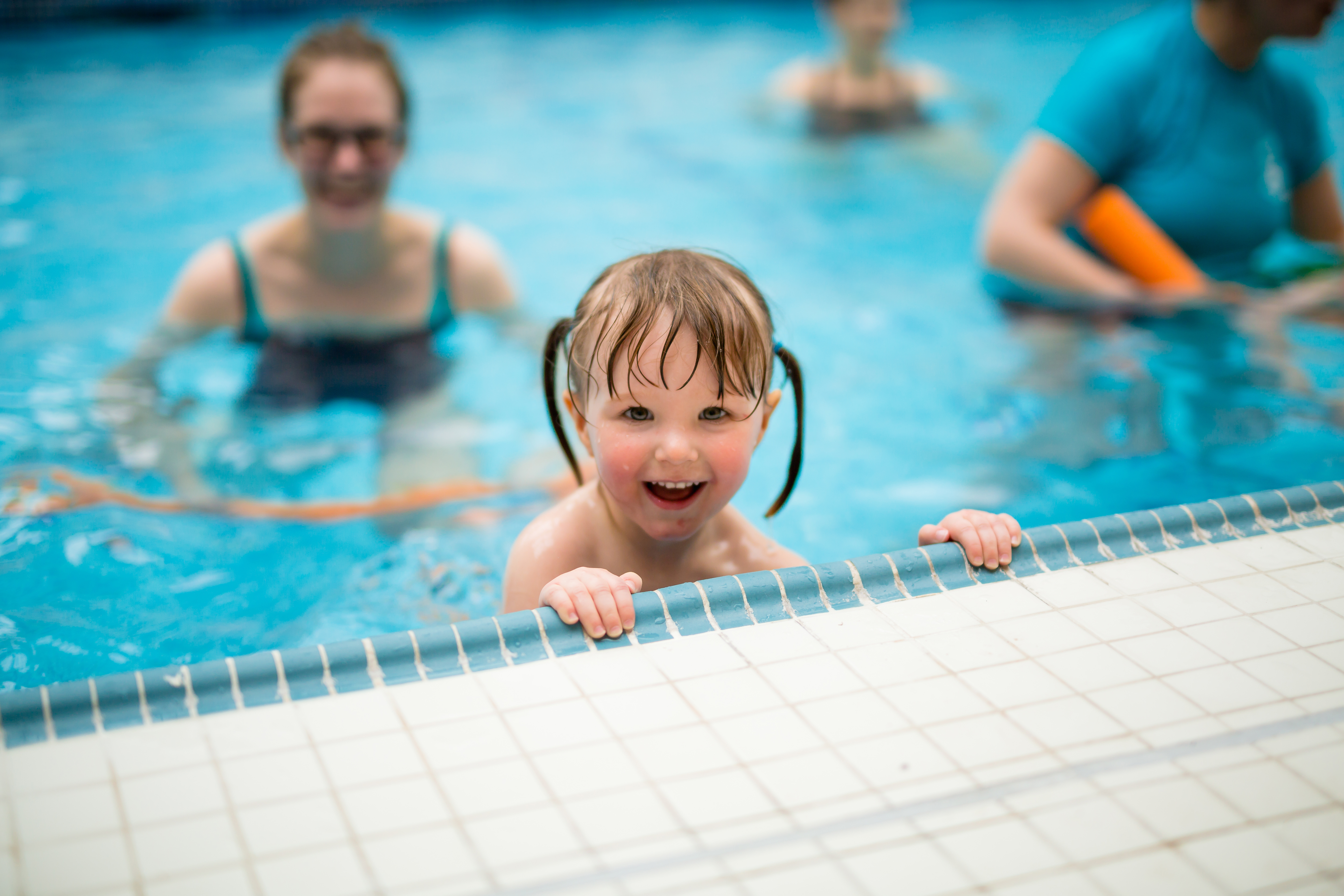 Pre-School Swimming Lessons (Child Holding Side Looking Over the Edge)