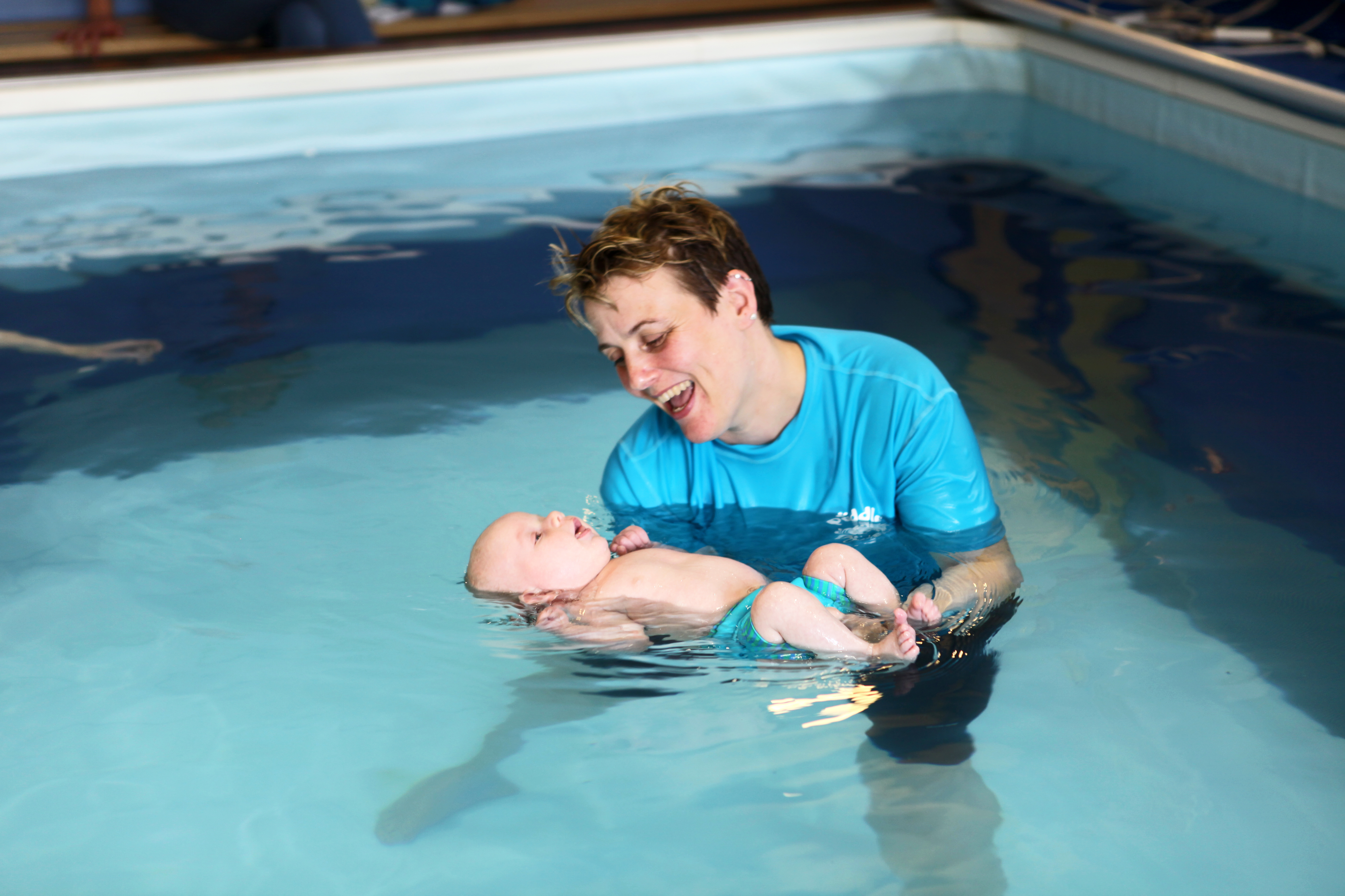 Baby Swimming Lessons (Teacher Holding Baby)