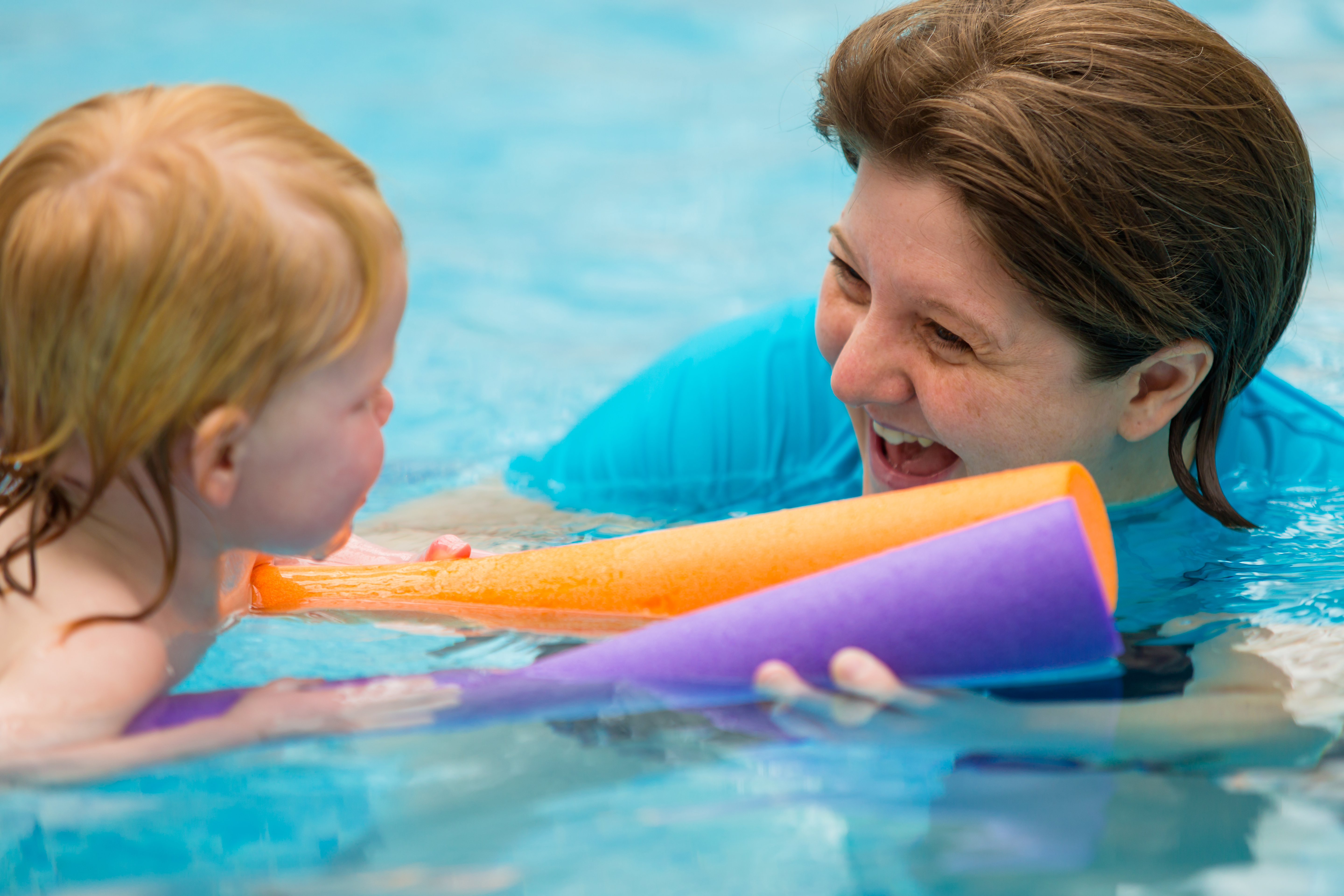 Pre-School Swimming Lesson (Woggles and Teacher)