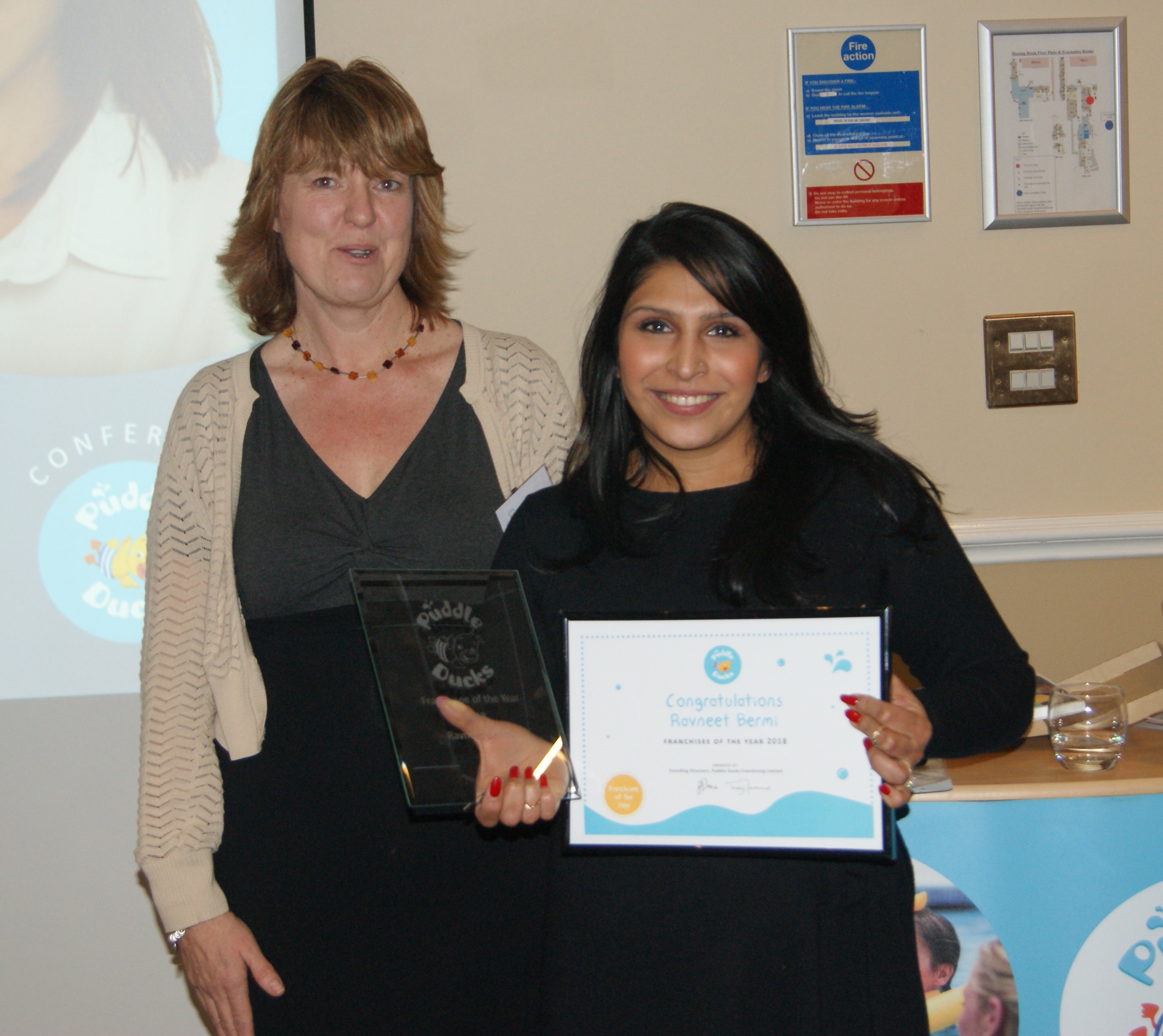 Ravneet Bermi receiving her Franchisee of the Year Award 2018
