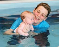 baby with smiley tina